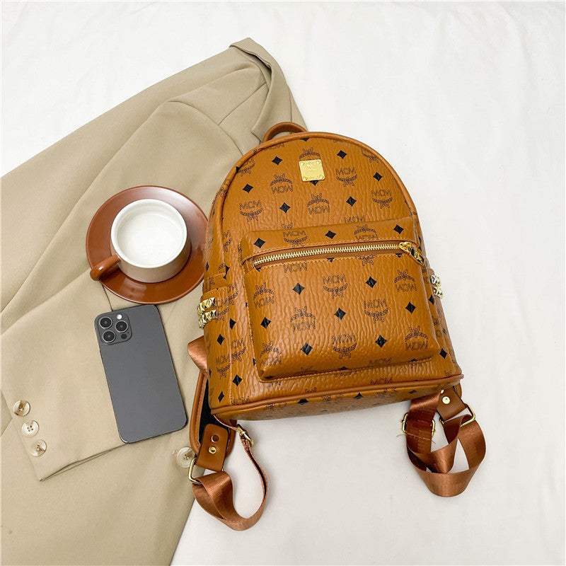 High - end genuine leather texture women's bag, large - capacity soft leatherbag Wide shoulder straps and matte leather backpacks create a retro and relaxed look